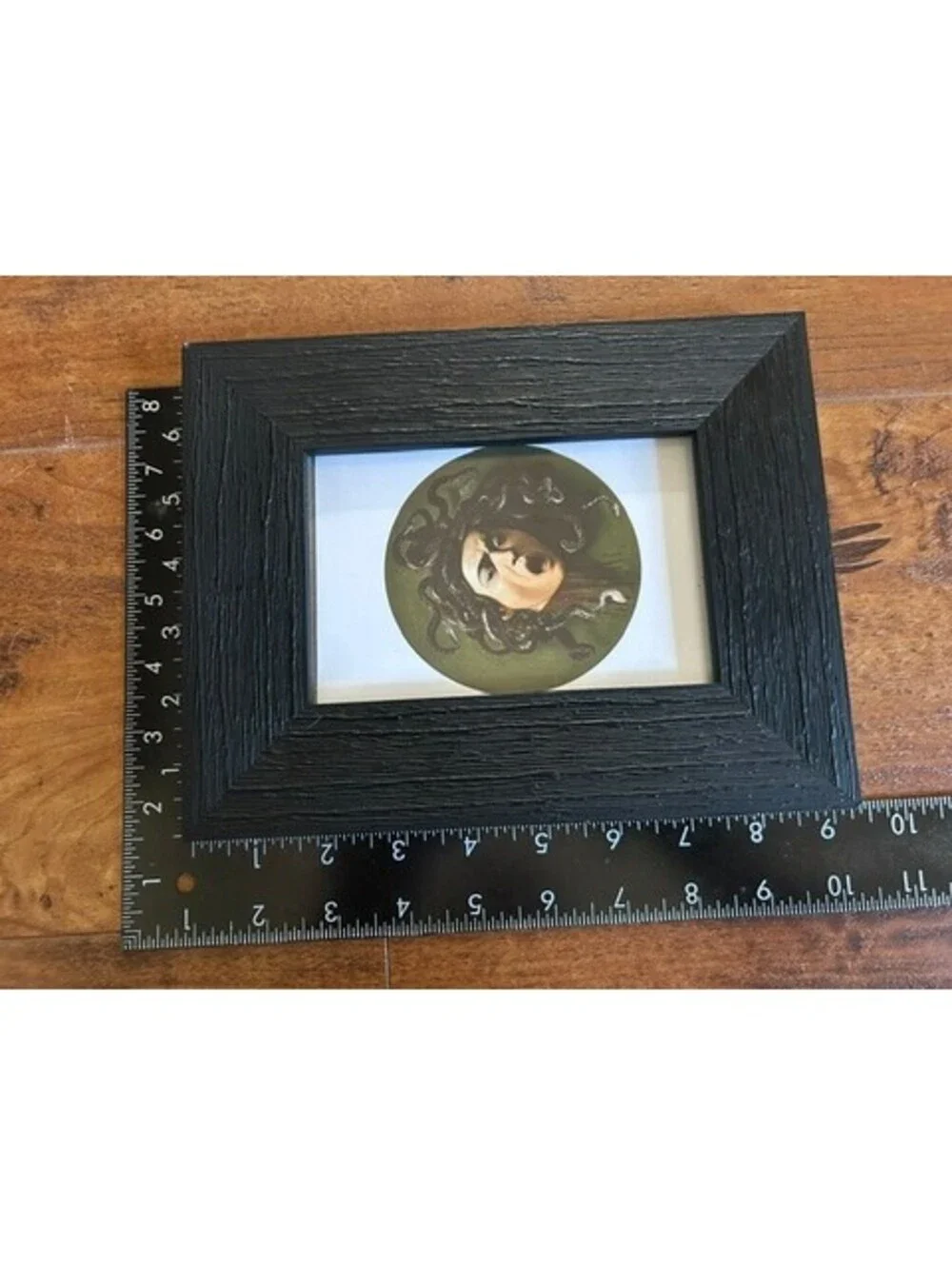 Framed Caravaggio's Medusa Head Art Print with Textured Black Frame
